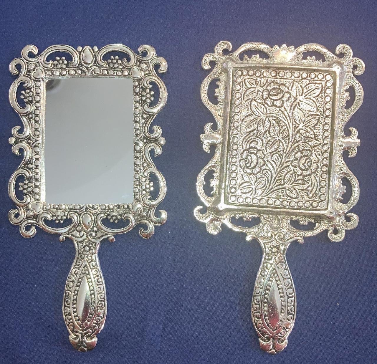 Hand mirror in German silver 