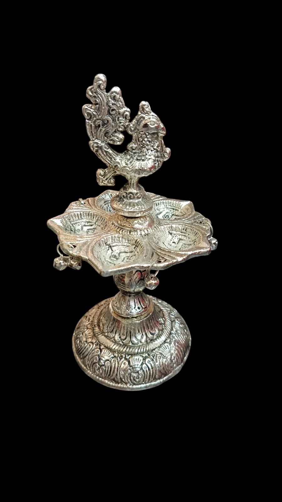 Peacock diya stand in German silver 